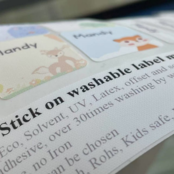 Material de etiquetas de ropa lavable para aplicación directa en tela 