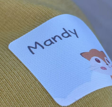 Material de etiquetas de ropa lavable para aplicación directa en tela